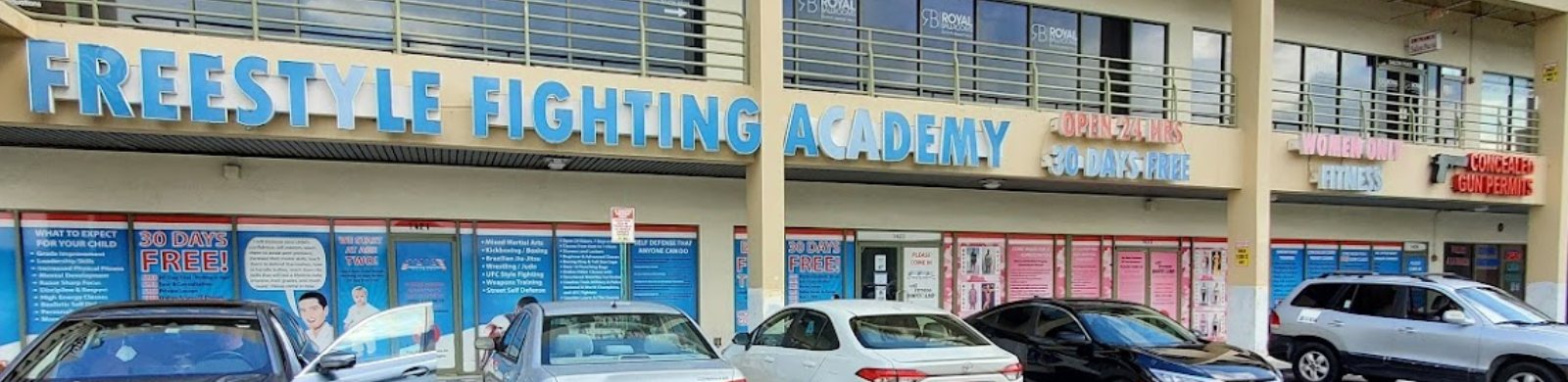 The Freestyle Fighting Academy storefront and sign